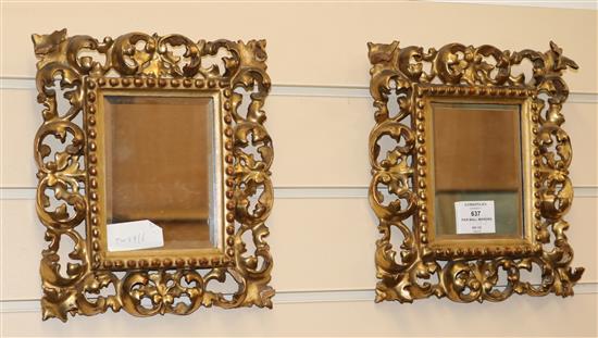 A pair of 19th century Florentine carved giltwood rectangular wall mirrors, H.25cm